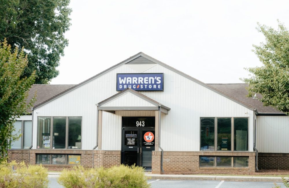 The Warren's Drug Store and pharmacy in Mebane building and entrance with sign