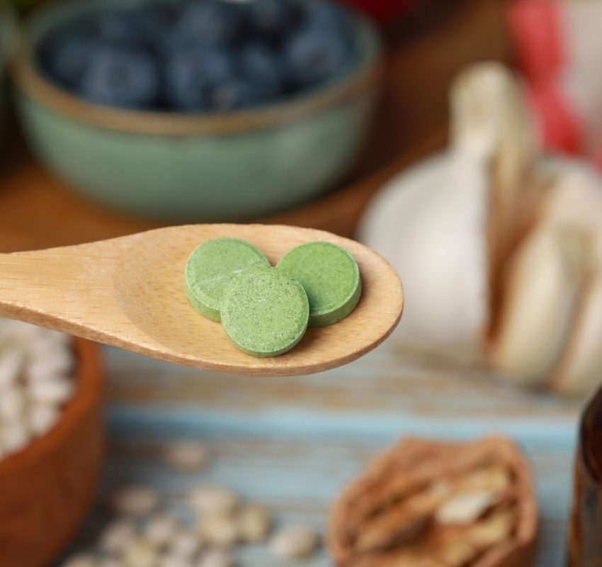 Supplements on wood spoon