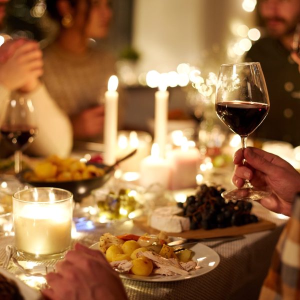 Family friends at holiday party discuss hacks about weight gain