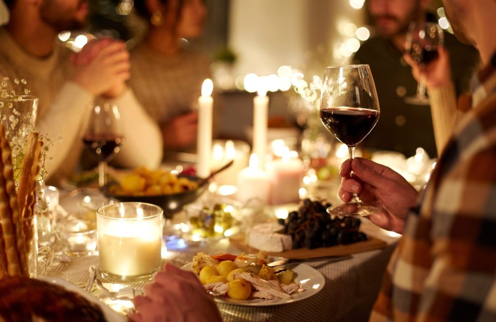 Family friends at holiday party discuss hacks about weight gain