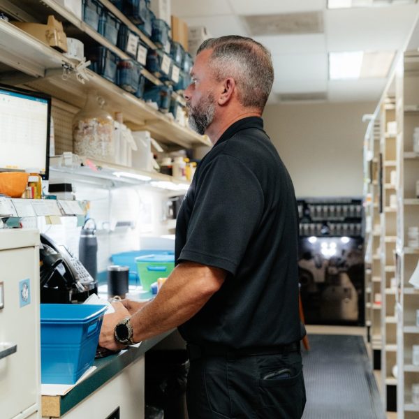 Compounding staff member help provider online at Warren's Drug Store