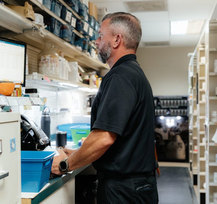 Compounding staff member help provider online at Warren's Drug Store