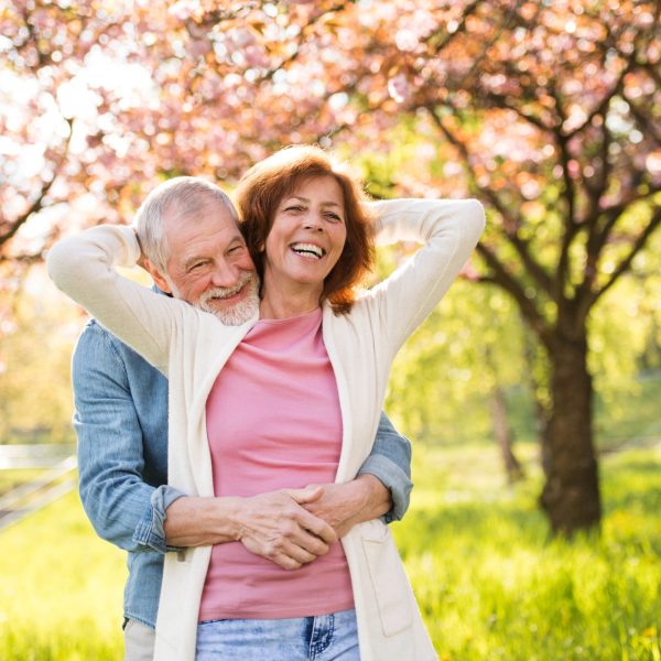 Older couple outdoors at dusk near efland